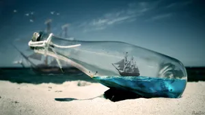 Bottled Ship On Beach Wallpaper