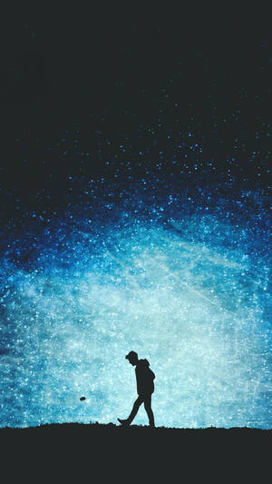Boy Walking At Starry Sky Wallpaper