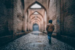 Boy Walking In Rainy Day Wallpaper