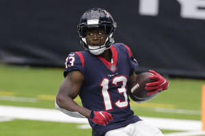 Brandin Cooks Holding A Ball Wallpaper