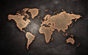 Brass World Map On A Black Stone Background Wallpaper