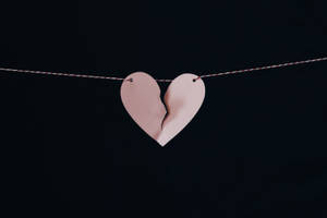 Break Up Heart On String Wallpaper