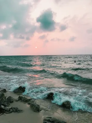 Breathtaking Sunset Over Seashore On An Amazing Iphone Wallpaper