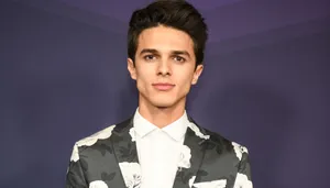 Brent Rivera In Floral Suit Wallpaper