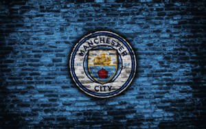 Brick Wall With Manchester City Logo Wallpaper