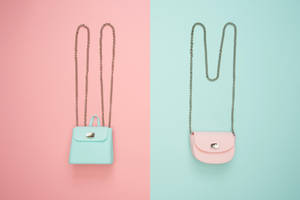 Bright & Stylish Pastel Pink & Teal Sling Bag Wallpaper