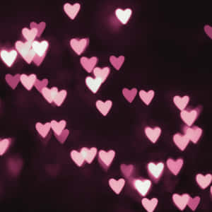 Brighten Up Your Work Day With A Beautiful Pink Ipad Pro. Wallpaper