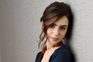 British-american Actress Lily Collins Portrait Wallpaper