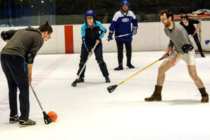 Broomball Group Of Men Wallpaper