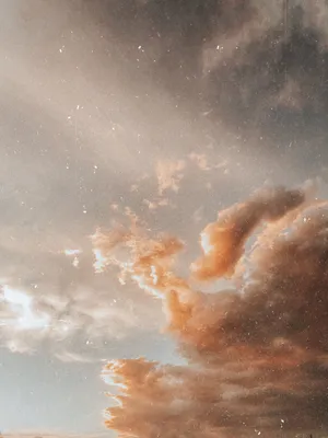 Brown Aesthetic Clouds Wallpaper