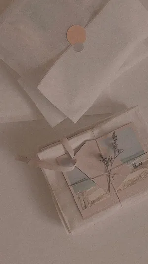 Brown And White Leaves Laying Atop A Mountain Wallpaper