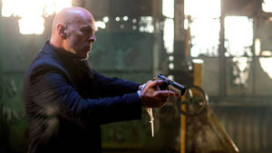 Bruce Willis Extraction Gun Still Wallpaper