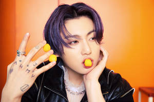 Bts Butter Jungkook Munching On Cheeseballs Wallpaper