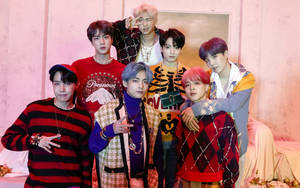 Bts Group Photo In Fashion Outfits Wallpaper