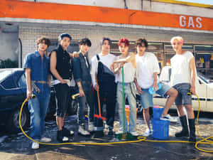 Bts Photoshoot At A Gas Station Wallpaper