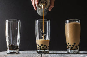 Bubble Tea Poured On Glass Wallpaper