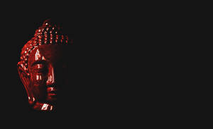 Buddha Head Figurine Black Wallpaper
