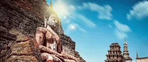 Buddha Statue Under Sun Wallpaper