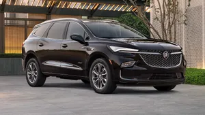 Buick Enclave Parked In Outdoor Parking Lot Wallpaper