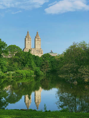 Buildings Reflected On Central Park Lake Wallpaper