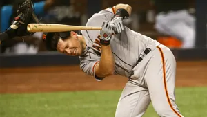 Buster Posey Being Hit Wallpaper