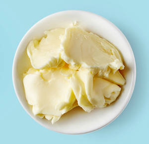Butter White Bowl On Light Blue Wallpaper