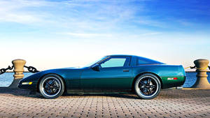 C4 Corvette On A Pier Wallpaper