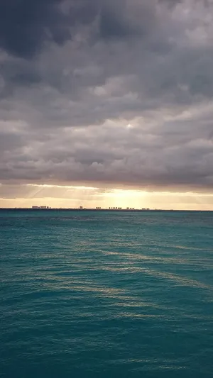 Calm Sea On Cloudy Day Smartphone Background Wallpaper