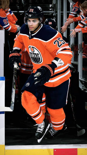 Canadian Edmonton Oilers Defenseman Darnell Nurse During Nhl Action Wallpaper