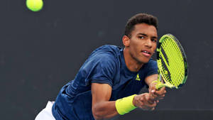 Canadian Tennis Prodigy Felix Auger Aliassime In A Mood Wallpaper