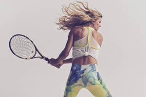 Canadian Tennis Star Eugenie Bouchard In Action Wallpaper