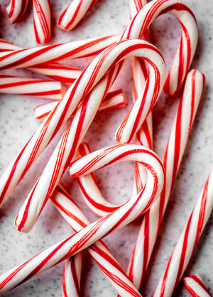 Candy Canes White With Red Stripes Wallpaper