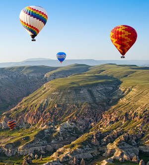 Cappadocia Balloons Grassy Hills Wallpaper