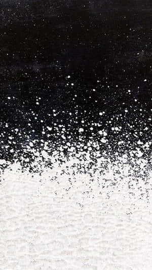 Caption: A Mesmerizing Pattern Of Black And White Dots Wallpaper