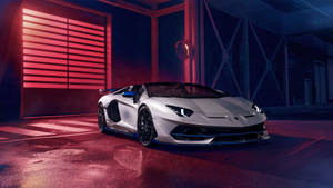 Caption: A Stunning Lamborghini Aventador Svj Xago In Midnight Blue Wallpaper