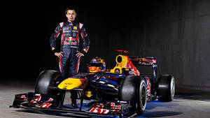 Caption: Alexander Albon In Red Bull Racing Gear Wallpaper