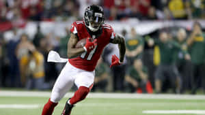 Caption: Atlanta Falcons Standout Wide Receiver Julio Jones Wallpaper