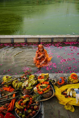 Caption: Authentic Celebration Of Chhath Puja Wallpaper