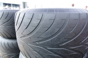 Caption: Bridgestone High-performance Auto Tire Wallpaper