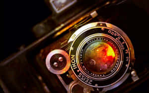 Caption: Classic Zeiss Ikon Vintage Photography Camera Wallpaper