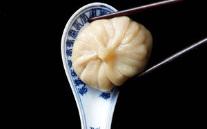 Caption: Delicious Xiaolongbao Soup Dumplings Ready To Eat Wallpaper