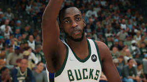 Caption: Determined Khris Middleton In Nba 2k Action Wallpaper