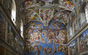 Caption: Divine Artistry - Ceiling Of The Sistine Chapel Wallpaper