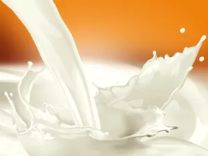 Caption: Dynamic Milk Splash Artistic Illustration Wallpaper