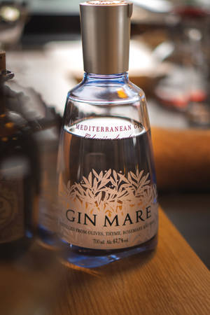 Caption: Elegance In A Bottle - A Close-up Of Gin Mare. Wallpaper