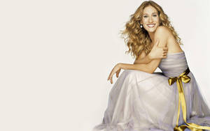 Caption: Elegant Sarah Jessica Parker At A Fashion Event Wallpaper