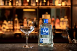 Caption: Exquisite 1800 Tequila Reserva Silver On Bar Countertop Wallpaper