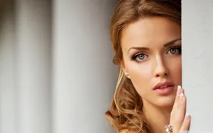 Caption: Graceful Beauty Behind The Column Wallpaper