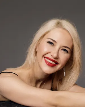 Caption: Graceful Mature Woman Embracing Aging Wallpaper