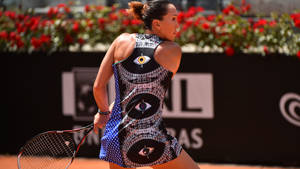 Caption: Jelena Jankovic Sporting An Eye-pattern Dress At A Tennis Event. Wallpaper